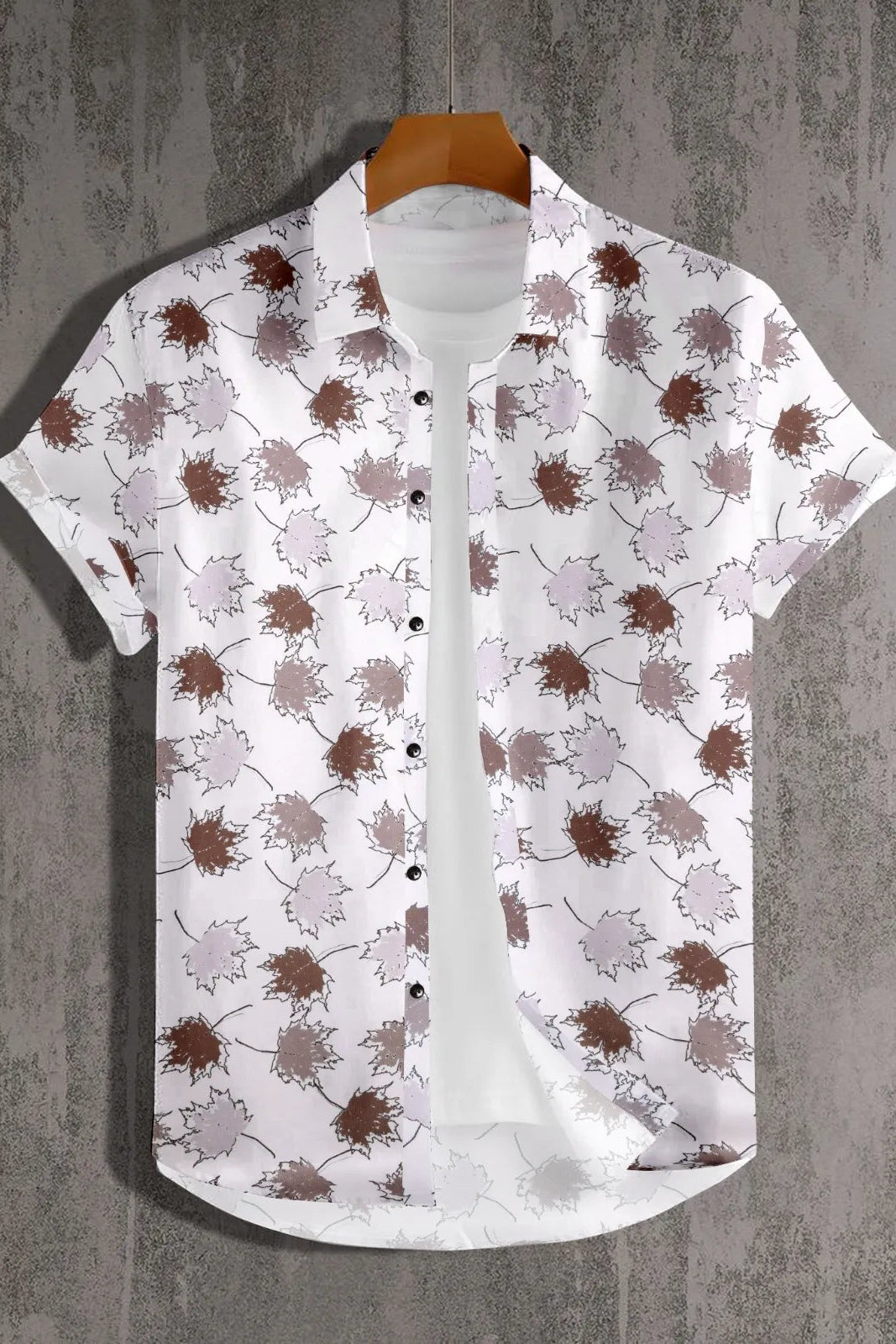 White shirt with brown abstract pattern on a textured gray background