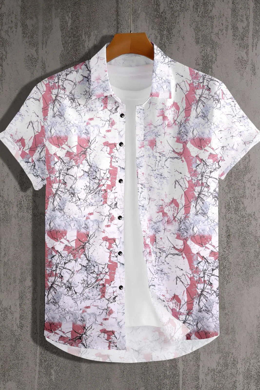 Short-sleeve shirt with floral pattern on a textured gray background