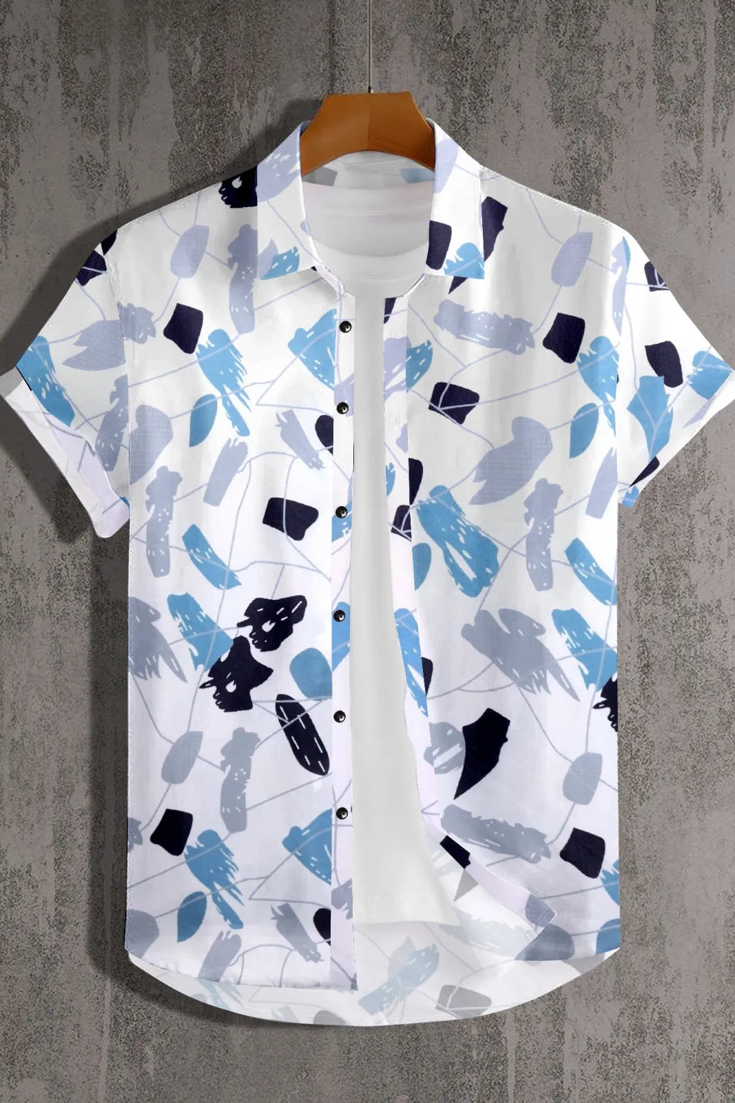 Short-sleeve shirt with abstract pattern on a textured gray background