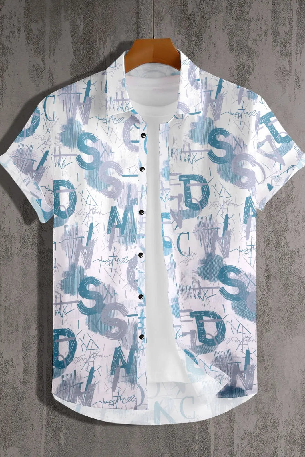 Short-sleeve shirt with abstract letter design on a textured gray background