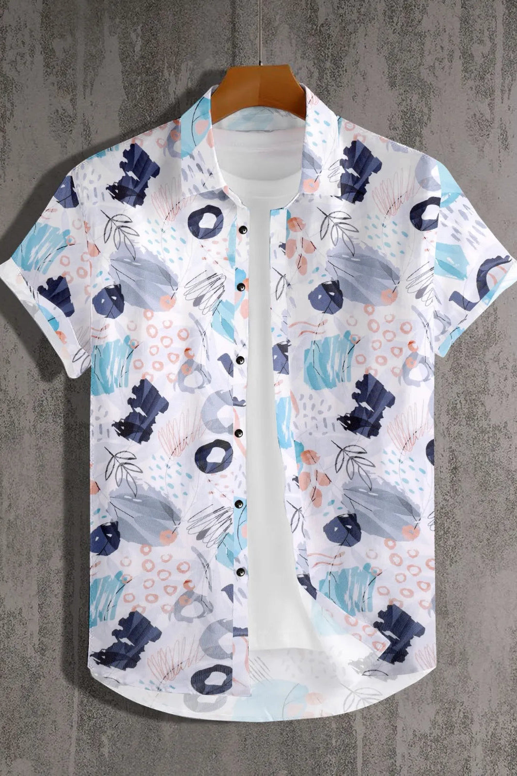 Short-sleeve shirt with abstract pattern on a textured gray background
