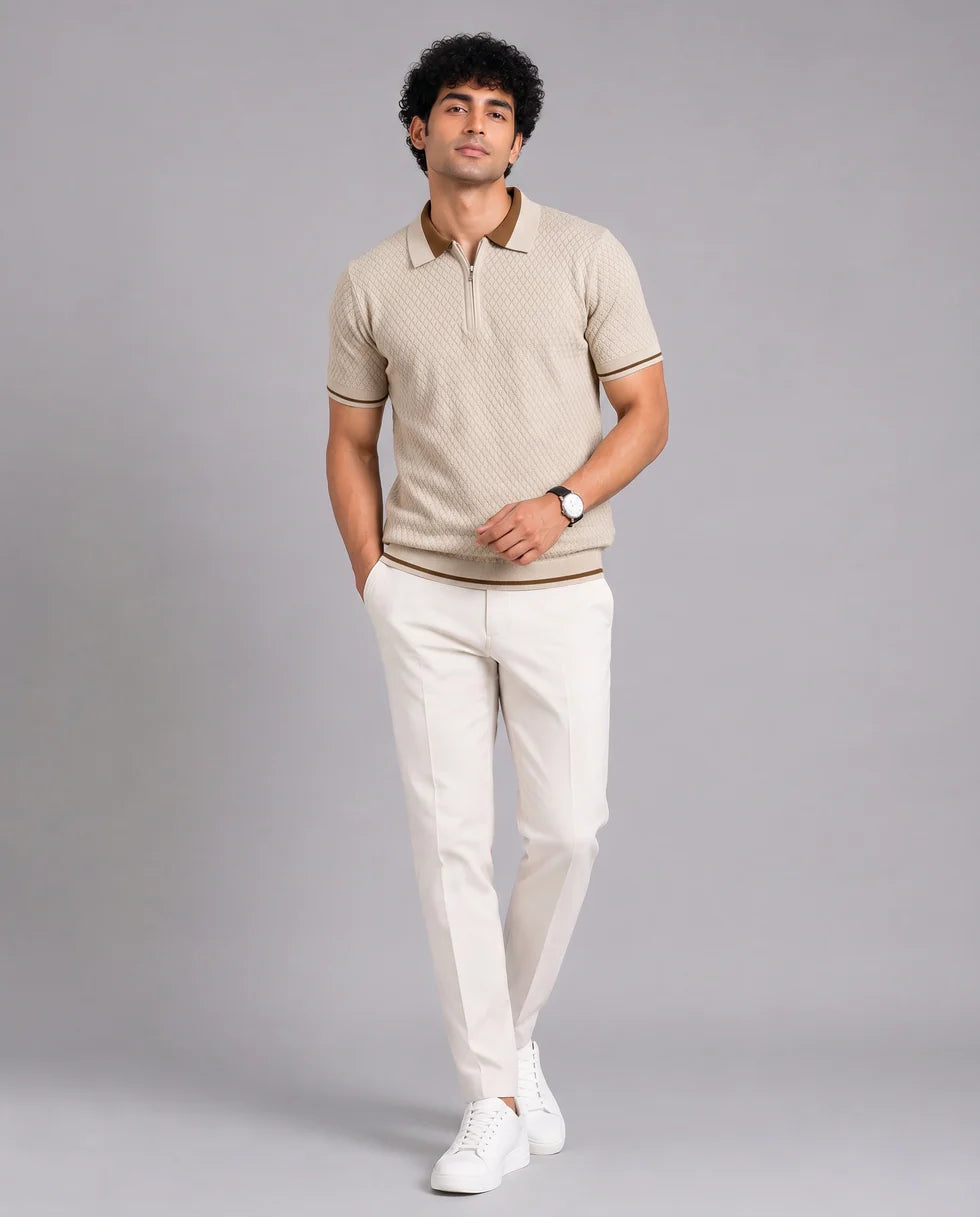Full-length front view of a model wearing the sandstone diamond jacquard polo